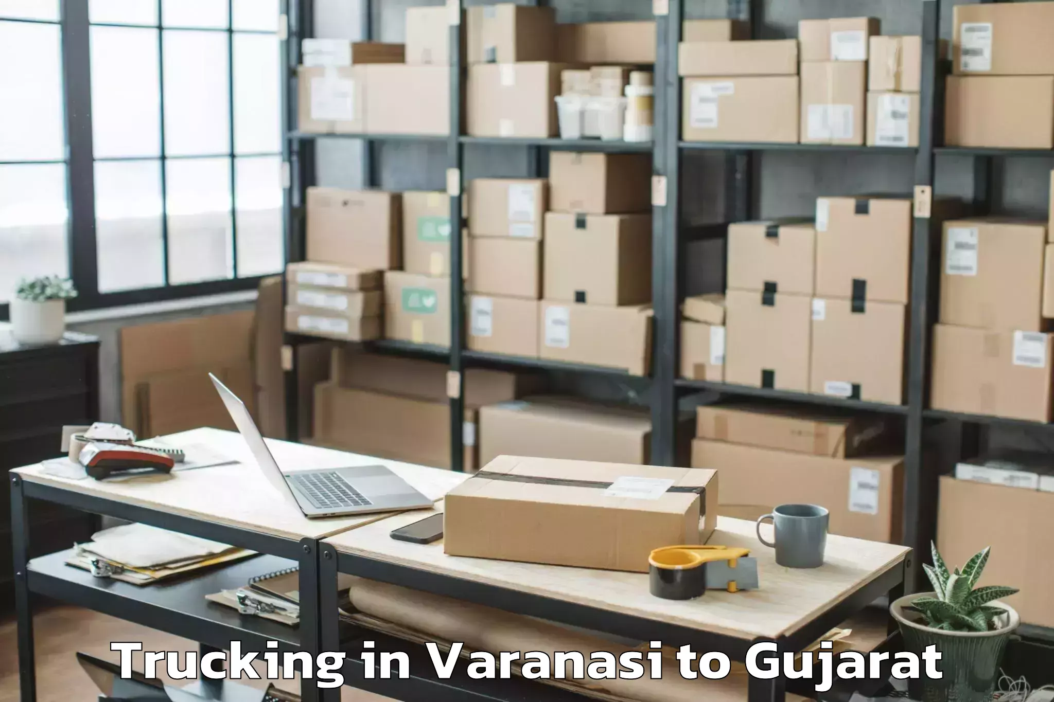 Top Varanasi to Vadnagar Trucking Available